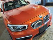 BMW 118i 2016 - Used Car in Eye-catching Orange for sale