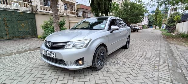 Silver 2014 Toyota Axio 1.5 Hybrid 2WD - Fuel Efficient Ride