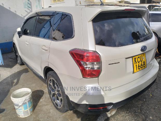 2013 White Subaru Forester 2.5XT Touring: Performance-Oriented SUV