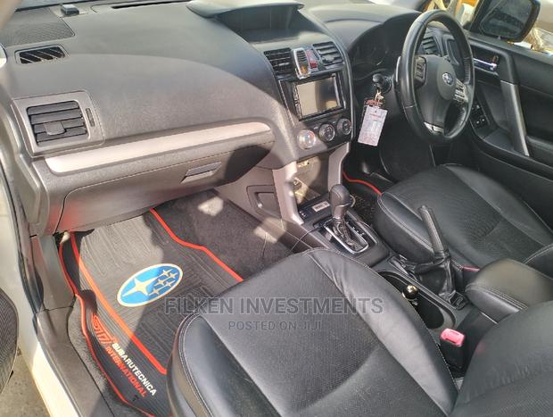 2013 White Subaru Forester 2.5XT Touring: Performance-Oriented SUV
