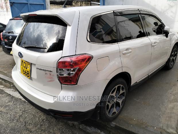 2013 White Subaru Forester 2.5XT Touring: Performance-Oriented SUV