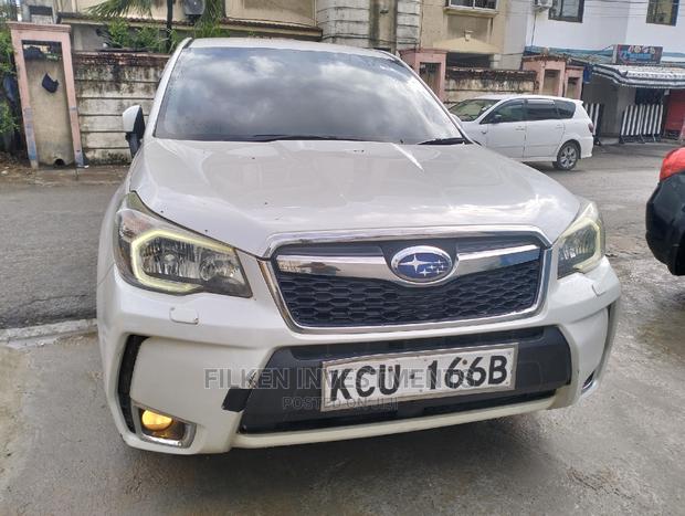 2013 White Subaru Forester 2.5XT Touring: Performance-Oriented SUV