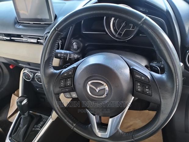 2014 Mazda Demio in Blue: Reliable and Efficient Vehicle