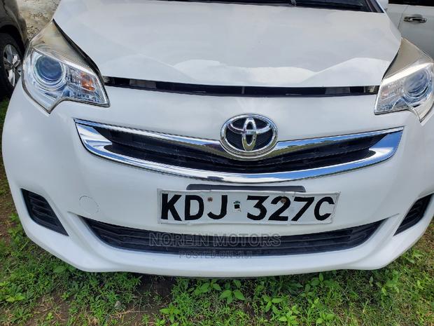 2015 Toyota Ractis in Pearl - Reliable and Efficient Compact Hatchback