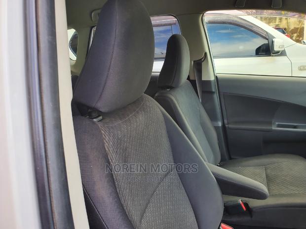 2015 Toyota Ractis in Pearl - Reliable and Efficient Compact Hatchback