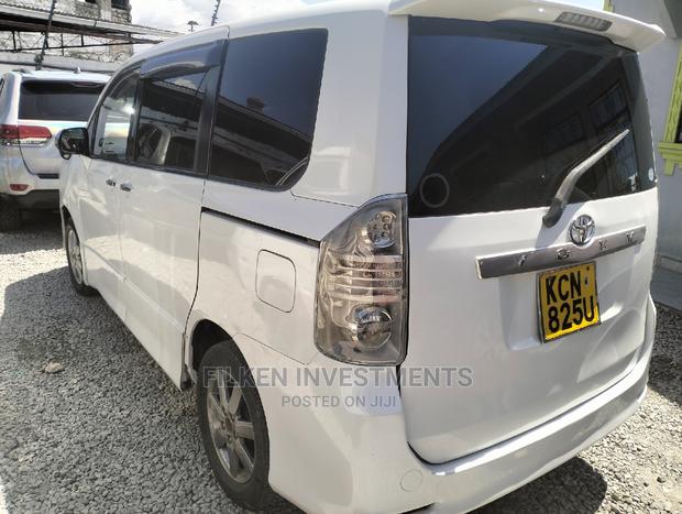White Toyota Voxy 2010 - Affordable and Comfortable Minivan