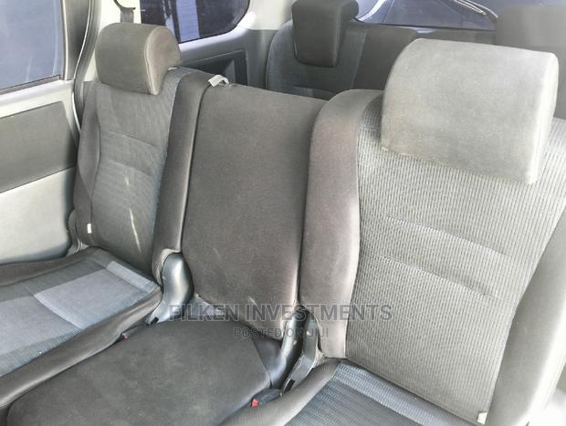 White Toyota Voxy 2010 - Affordable and Comfortable Minivan