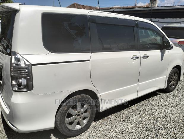 White Toyota Voxy 2010 - Affordable and Comfortable Minivan