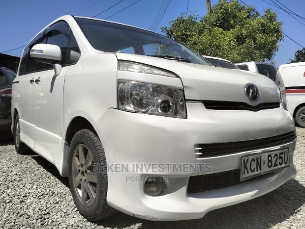 White Toyota Voxy 2010 - Affordable and Comfortable Minivan