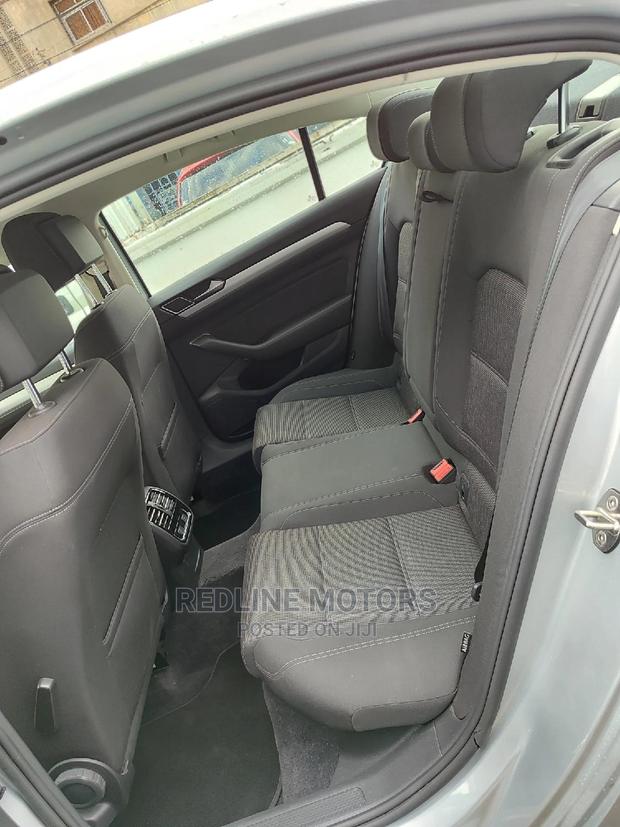 2016 Volkswagen Passat in White: Premium Sedan