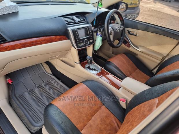 2012 Toyota Allion Red: Luxury Sedan with Style and Comfort