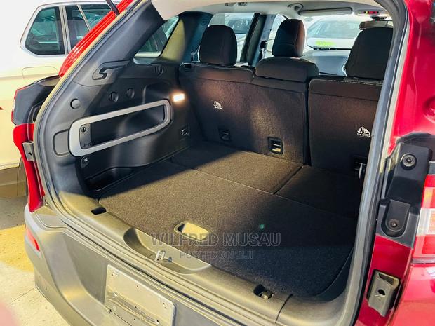 Red 2015 Jeep Grand Cherokee - Stylish, Powerful, and Reliable