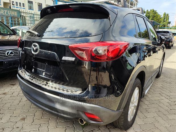 Pre-Owned 2016 Mazda CX-5 Sport AWD Black: Luxury SUV at a Bargain