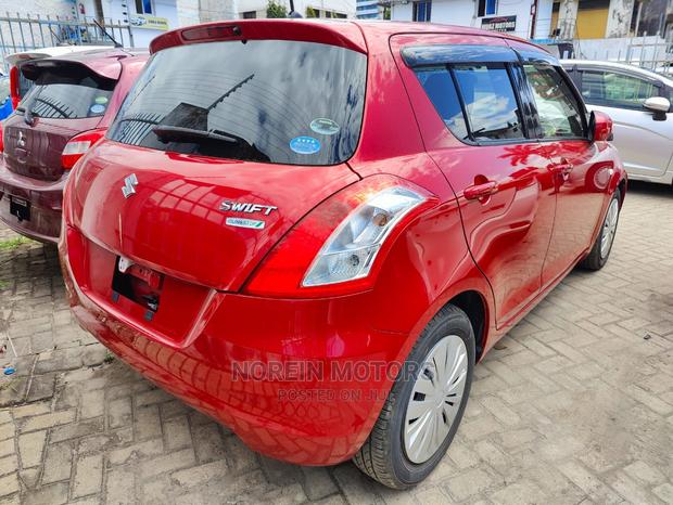 Red 2016 Suzuki Swift: Compact Car, Perfect for City Driving
