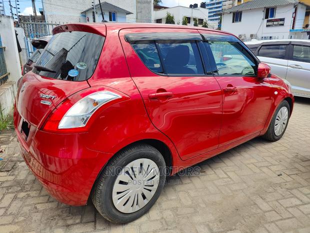 Red 2016 Suzuki Swift: Compact Car, Perfect for City Driving