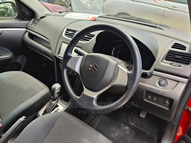 Red 2016 Suzuki Swift: Compact Car, Perfect for City Driving