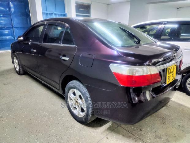 Compact Red Toyota Premio 1.5 FWD 2013 - Luxury Sedan