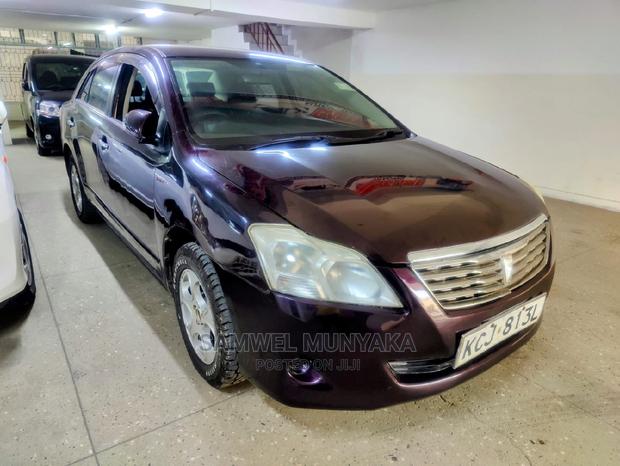 Compact Red Toyota Premio 1.5 FWD 2013 - Luxury Sedan