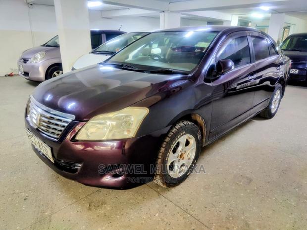 Compact Red Toyota Premio 1.5 FWD 2013 - Luxury Sedan