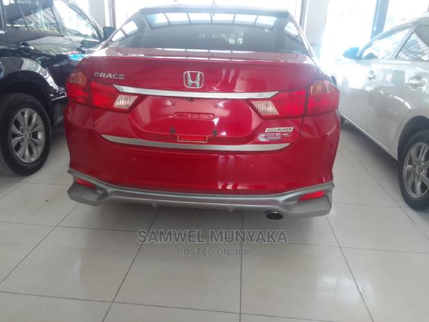 Pre-owned Honda Grace 1.5 Petrol AWD Red - Affordable Luxury