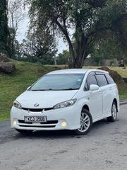 2010 Pearl Toyota Wish - Pre-Owned Sedan with Style and Comfort for sale