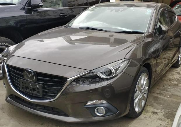 2016 Mazda Axela Gold Hatchback: Pre-Owned Offer