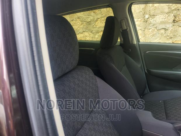 Brown 2016 Honda Fit: Compact Car for Urban Living