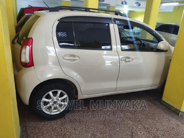 2014 Toyota Passo AWD Beige - Compact Car with All-Wheel Drive