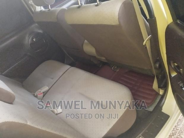 2014 Toyota Passo AWD Beige - Compact Car with All-Wheel Drive