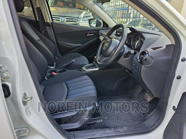 White Mazda Demio 2016 - Affordable Compact Crossover