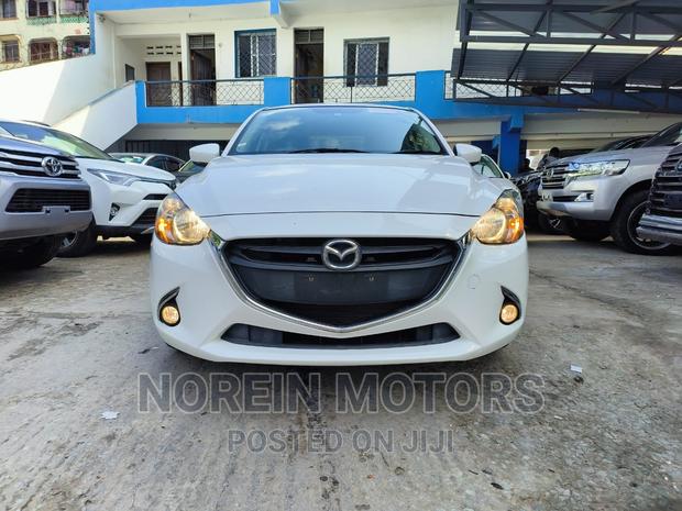 White Mazda Demio 2016 - Affordable Compact Crossover