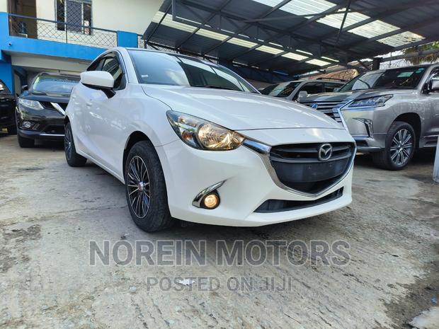 White Mazda Demio 2016 - Affordable Compact Crossover