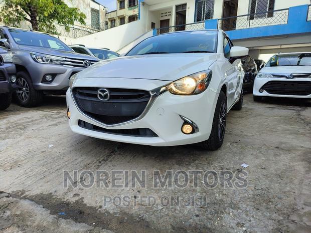 White Mazda Demio 2016 - Affordable Compact Crossover