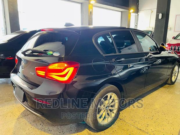 Black 2016 BMW 118i xDrive - Pre-owned All-Wheel Drive Sedan