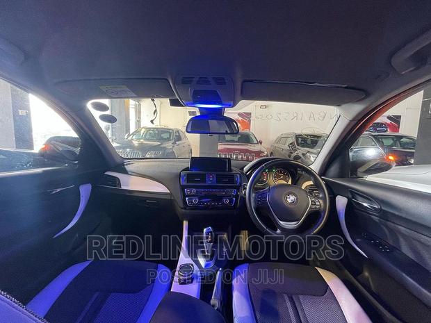 Black 2016 BMW 118i xDrive - Pre-owned All-Wheel Drive Sedan