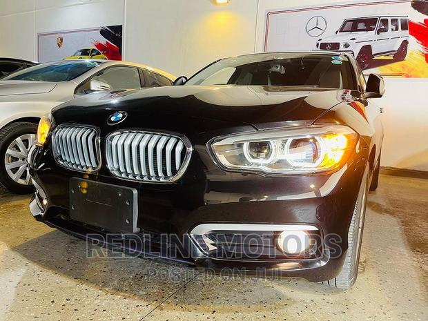 Black 2016 BMW 118i xDrive - Pre-owned All-Wheel Drive Sedan