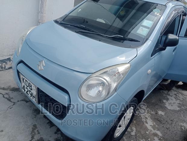 Blue 2014 Suzuki Alto: Compact Car with Big Personality