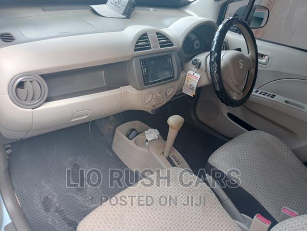 Blue 2014 Suzuki Alto: Compact Car with Big Personality