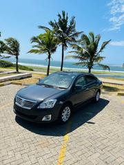 2016 Toyota Premio Burgundy Hybrid Sedan for sale