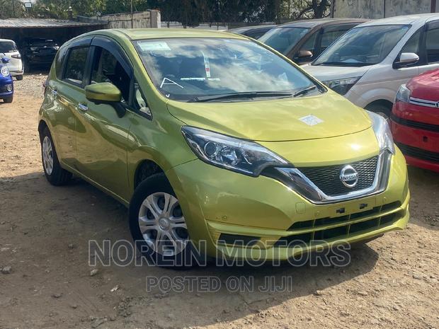 Yellow 2016 Nissan Note: Compact Car with a Sunny Personality!