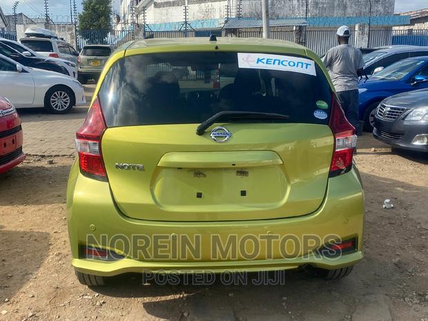 Yellow 2016 Nissan Note: Compact Car with a Sunny Personality!