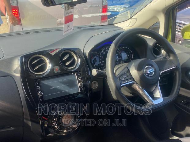 Yellow 2016 Nissan Note: Compact Car with a Sunny Personality!