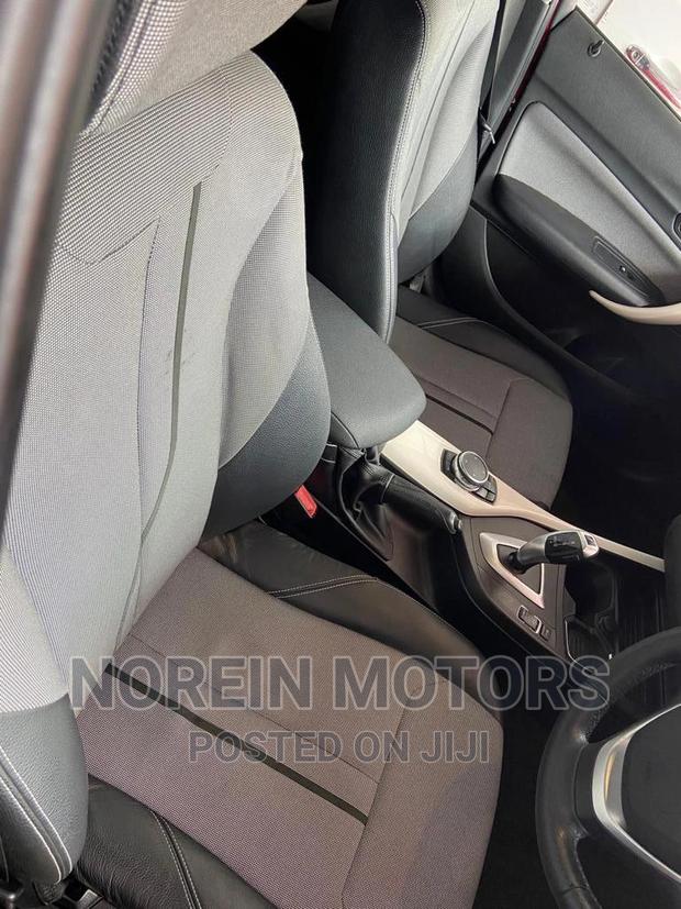Red 2016 BMW 118i - Luxury Pre-owned Compact