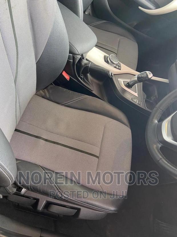 Red 2016 BMW 118i - Luxury Pre-owned Compact