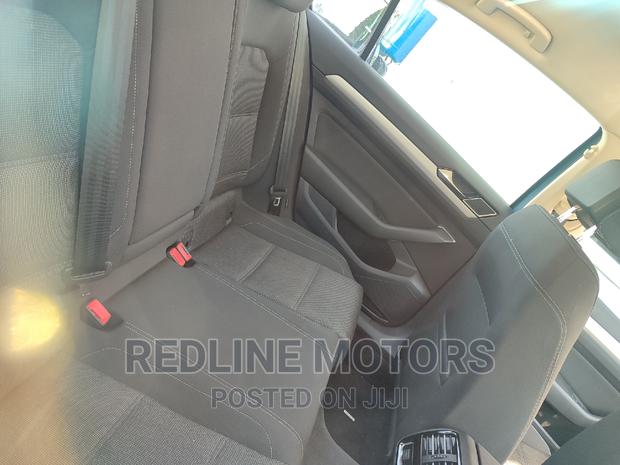 Volkswagen Passat 2016 Blue - Sleek & Fuel-Efficient Sedan