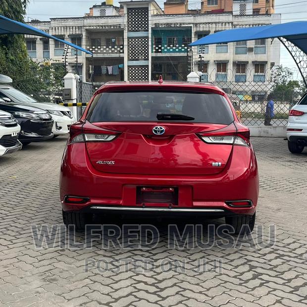 Red 2016 Toyota Auris: Stylish and Reliable Compact Sedan
