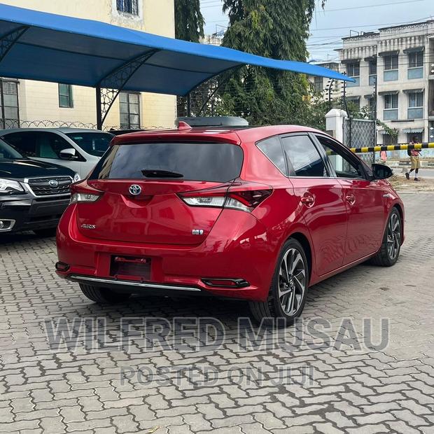Red 2016 Toyota Auris: Stylish and Reliable Compact Sedan