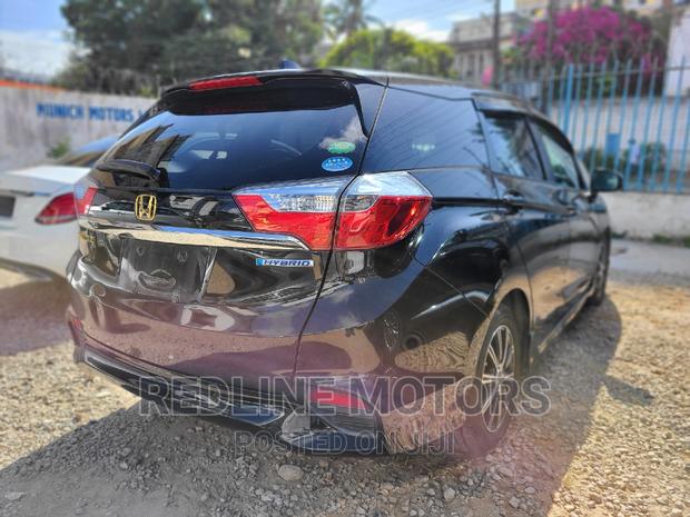 4WD Honda Shuttle 2016 Hybrid in Black - Premium Performance