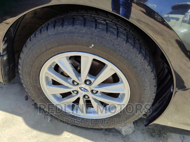 New 2016 Subaru Impreza Black: Compact Sedan with Style and Power