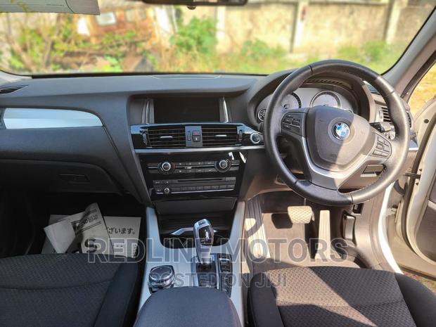 BMW 116i 2016 - Affordable, Stylish Orange Hatchback
